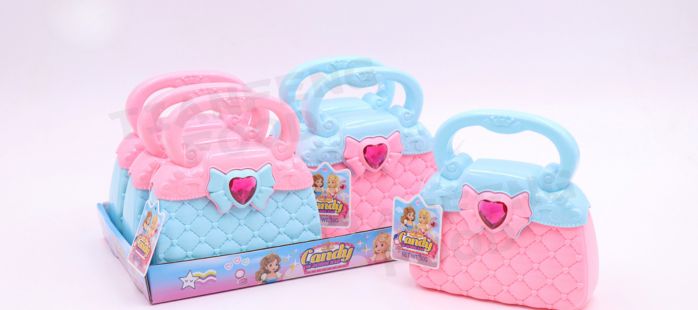 Cute handbag-shaped toy candy containers in pink and blue, featuring heart-shaped decorations and a quilted pattern. The bags include a pack of colorful star- and flower-shaped pressed candies, blending fun toy candy with a playful design for children. Created by Tianfengsweets, perfect for gifts or parties.
