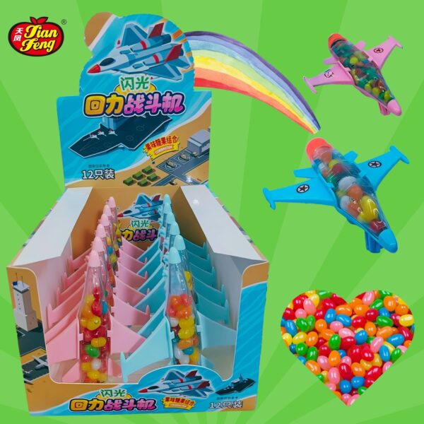 Colorful packaging of candy toy planes filled with multicolored jelly beans candies. The display box features bright graphics, and theres a heart-shaped arrangement of jelly beans candies nearby. A rainbow trails behind one candy toy plane.