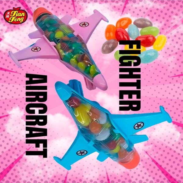 Two candy toy airplanes, one pink and one blue, filled with colorful jelly beans. The words Fighter Aircraft are displayed on the right. A transparent jelly bean assortment is scattered around. The background is vibrant pink with white clouds.